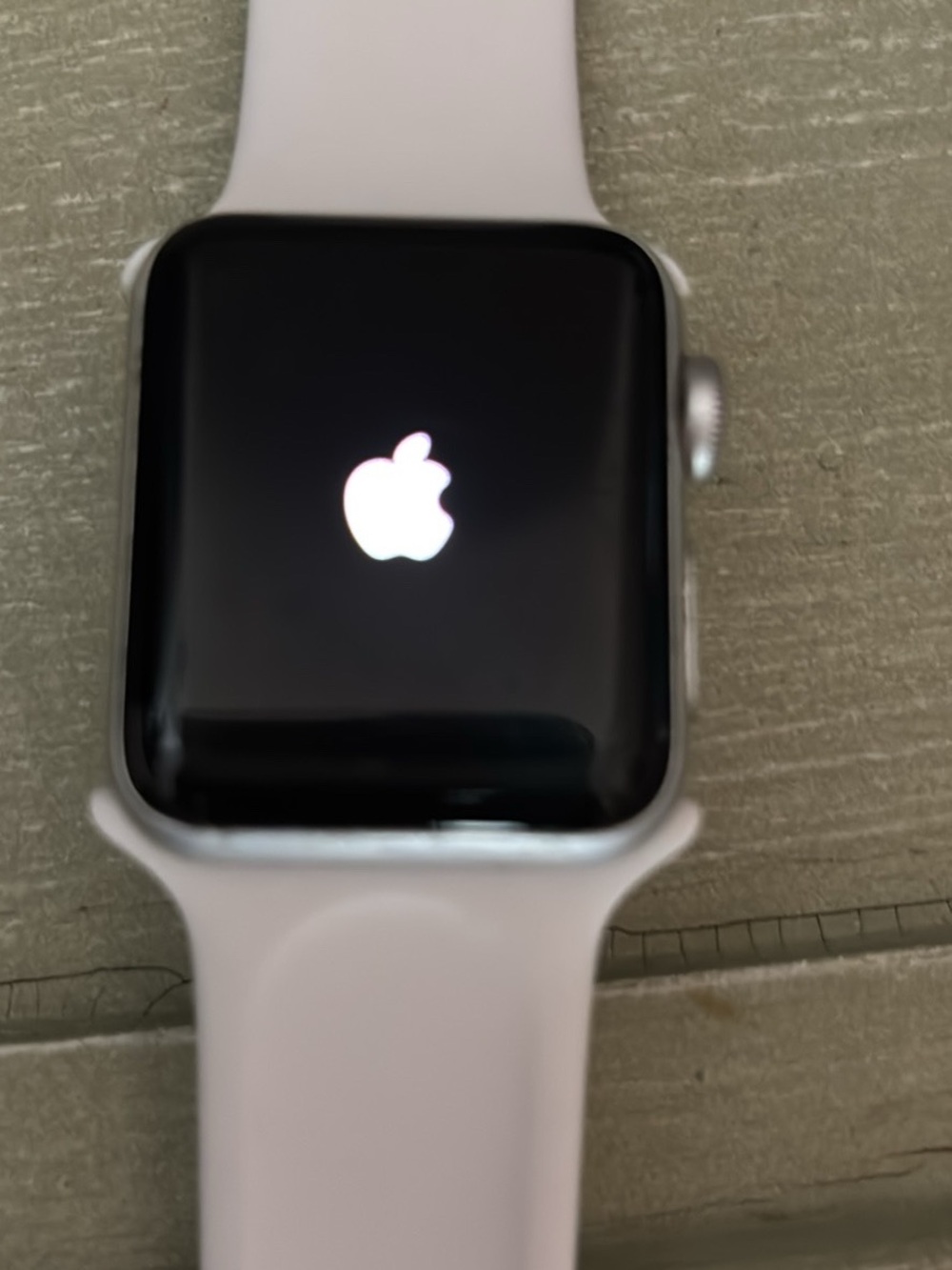 Apple Smartwatch with white Sport Band and Silver Case